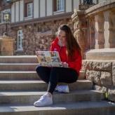Online MSU Denver student studying outside