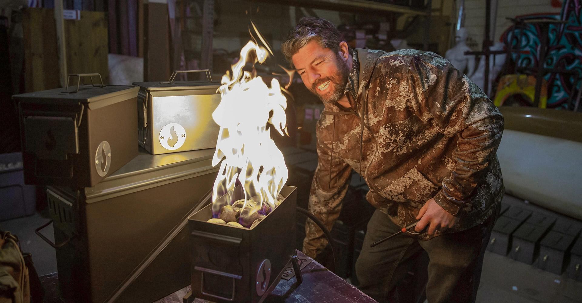 MSU Denver alumnus Josh Thurmond demonstrates the Lava Box, a portable campfire